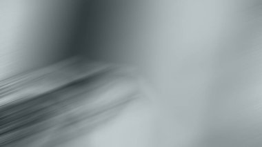 Cep telefonu tutan kişinin bulanık bir fotoğrafı.