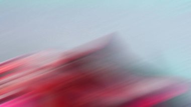 Kaykay tutan birinin bulanık bir resmi.