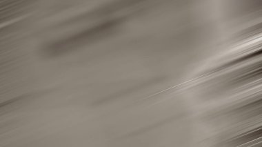 Karla kaplı bir yamaçta kar kayağı süren biri.