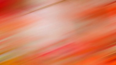 Kırmızı ve sarı bir çiçeğin bulanık bir resmi