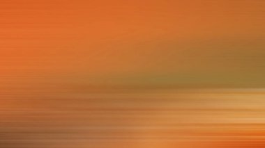 Gün batımının bulanık bir fotoğrafı ve uçan bir kuş.