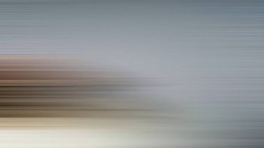 Kaykay süren birinin bulanık bir resmi.