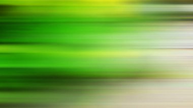 Kaykay süren birinin bulanık bir resmi.