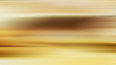 Sarı ve kahverengi arkaplanlı bulanık bir fotoğraf