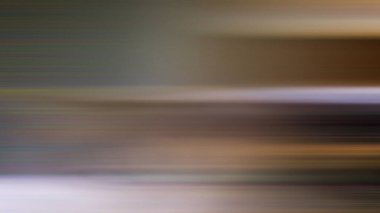 Kaykay süren birinin bulanık bir resmi.