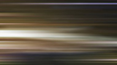 Kaykay süren birinin bulanık görüntüsü.