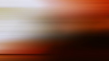 Kırmızı ve beyaz bir otobüsün bulanık fotoğrafı.