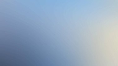 Arka planda mavi gökyüzü olan bir uçak gökyüzünde uçuyor.