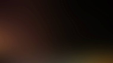 Cep telefonu tutan bir kişinin bulanık görüntüsü