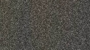 küçük gri küçük taşların siyah arkaplanı