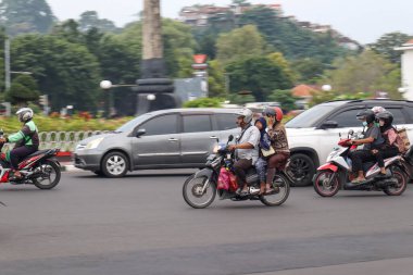Semarang, December 2022. A portrait of the hustle and bustle of traffic jams in the city of Semarang which is full of motorbikes and cars