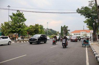 Semarang, December 2022. A portrait of the hustle and bustle of traffic jams in the city of Semarang which is full of motorbikes and cars
