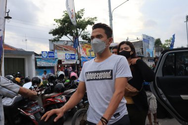 Semarang, December 2022. The atmosphere of the Tegal city square in the afternoon with many tourists visiting.