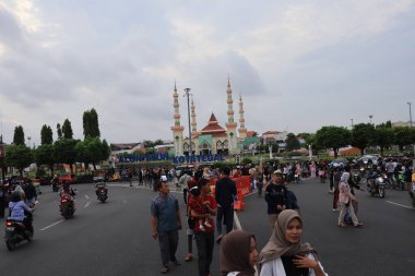 Semarang, December 2022. The atmosphere of the Tegal city square in the afternoon with many tourists visiting.
