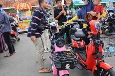 Semarang, December 2022. The atmosphere of the Tegal city square in the afternoon with many tourists visiting.