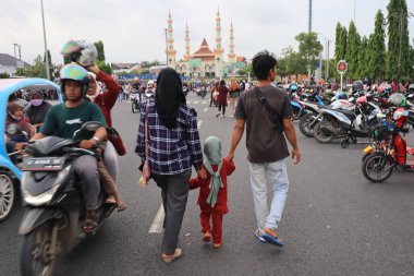Semarang, December 2022. The atmosphere of the Tegal city square in the afternoon with many tourists visiting.