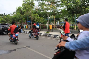 Semarang, December 2022. The atmosphere of the Tegal city square in the afternoon with many tourists visiting.