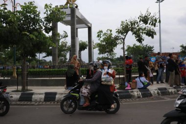 Semarang, December 2022. The atmosphere of the Tegal city square in the afternoon with many tourists visiting.