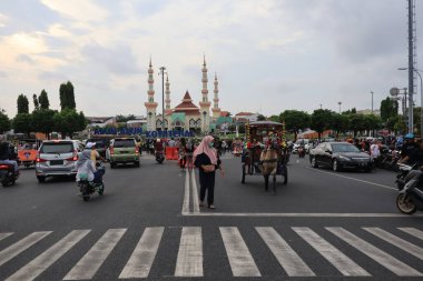 Semarang, December 2022. The atmosphere of the Tegal city square in the afternoon with many tourists visiting.