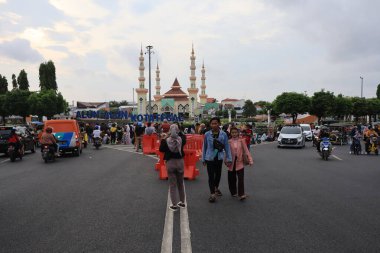 Semarang, December 2022. The atmosphere of the Tegal city square in the afternoon with many tourists visiting.
