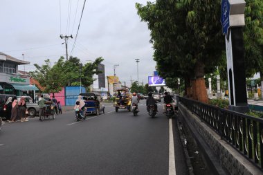 Semarang, December 2022. The atmosphere of the Tegal city square in the afternoon with many tourists visiting.