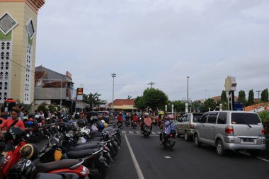 Semarang, December 2022. Photo of the motorbike parking lot in the Tegal city square which is crowded and full of motorcycle visitors.