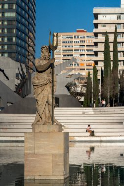 Neptune statue in the middle of the lake in Industrial park, Barcelona.