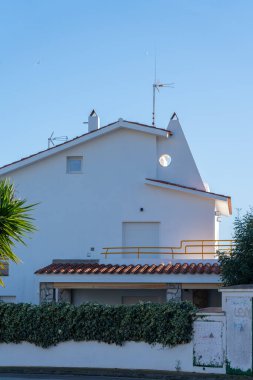 the beautiful white summer house in the city