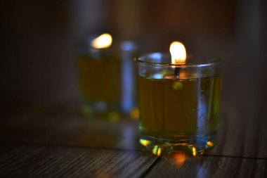 close up shot of candle on wooden table