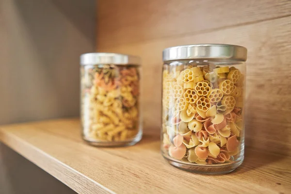 Pantry food cabinet. Kitchen storage organization. Pasta, grains in glass jars. Organic food. Home cooking. Nutrition food. Glass containers. Food preparation. Zero waste, plastic free. High quality