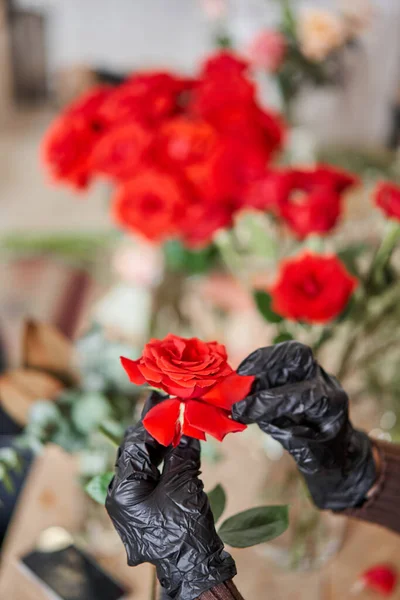 Florist prepares flowers. Fresh delivery in flower shop. High quality photo