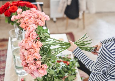 Florist prepares flowers. Fresh delivery in flower shop. High quality photo