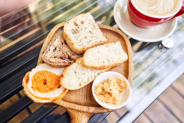 Assorted Sliced Bread Wooden Board Served Smoked Butter Breakfast Cappuccino — Stock Photo, Image