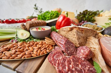 Table full of mediterranean appetizers, tapas or antipasto. Assorted Italian food set. Delicious snack on party or picnic time. Meat and cheese. Italian style banquet. . High quality photo