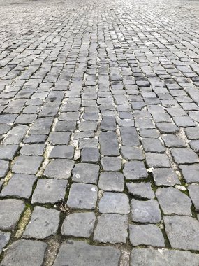 Sampietrini stone paved square in Rome, Italy