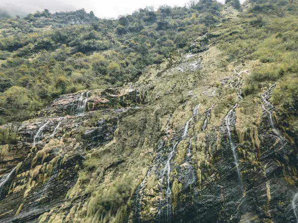stock image waterfall in nepal, best waterfall, waterfall during annapurna base cam trek