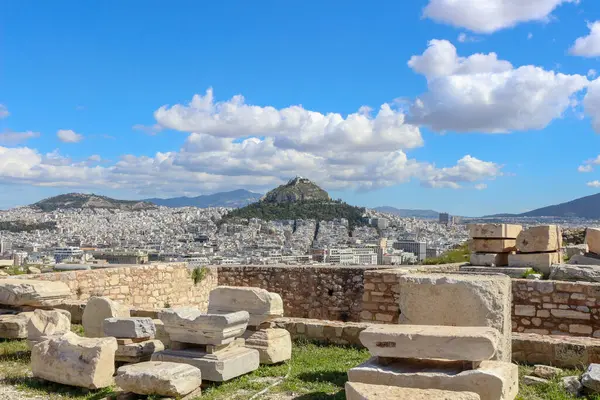 stock image Gaze upon the stunning vista of Lycabettus Hill from the elevated vantage point of the Acropolis, capturing the essence of Athens' captivating landscape and architectural splendor.