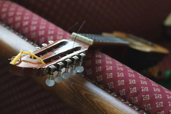 stock image A beautifully detailed image of the head part and tuning pegs of a Charango, a traditional South American stringed instrument. Captured with a soft focus on the tuners.