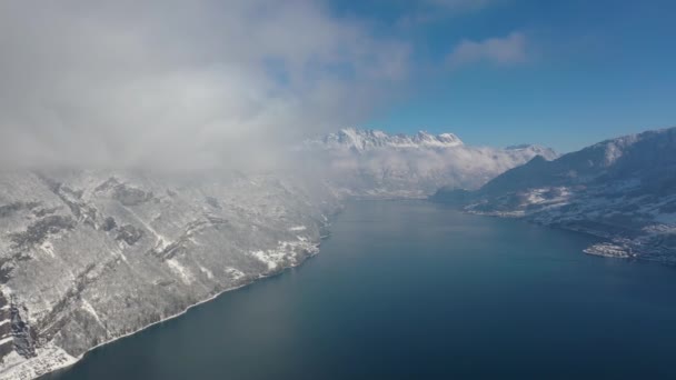 Great Aerial Footage Blue Lake Surrounded Snowy White Landscape — Vídeos de Stock