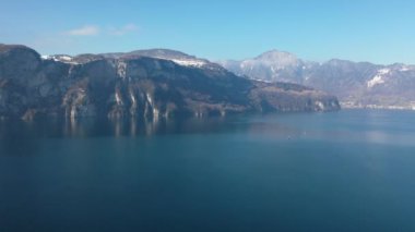 Great aerial footage in 4K taken with a drone on a sunny day over Lake Lucerne.