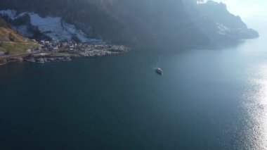 Great aerial footage in 4K taken with a drone on a sunny day over Lake Lucerne.
