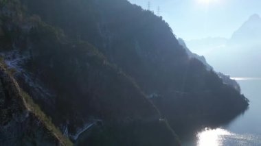 Great aerial footage in 4K over the beautiful snowy Swiss landscape in the canton of Lucerne.