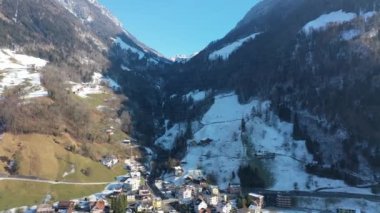 Great aerial footage in 4K over a beautiful Swiss mountain lake in the middle of the Swiss Alps.