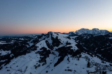 Amazing view of the snowy peaks in the Swiss Alps on a colorful morning.