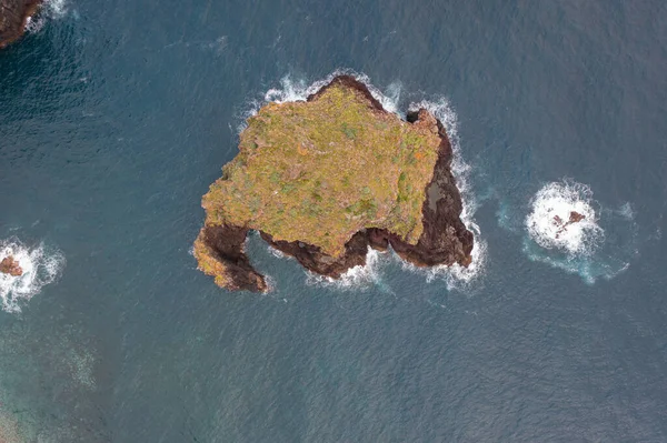 Great drone photo from a bird\'s perspective of the cliffs off the coast of Madeira.