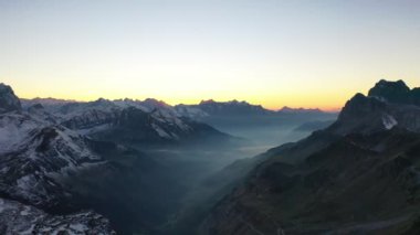 Great 4K aerial footage of a sunset over the Swiss Alps on the Klausenpass.