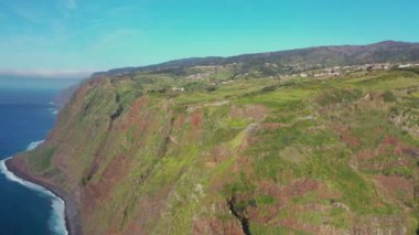 Beautiful flight over the cliffs of Madeira's coasts. The beautiful sides of Portugal's countryside.