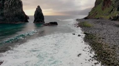 Stunning drone footage over the beautiful volcanic island called Madeira in Portugal. Ribeira da Janela is the name of the vantage point in the north of the island.