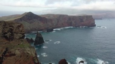 Epic flight over the wonderful viewpoint called Ponta de So Loureno in Madeira, Portugal. A great coast with many cliffs.