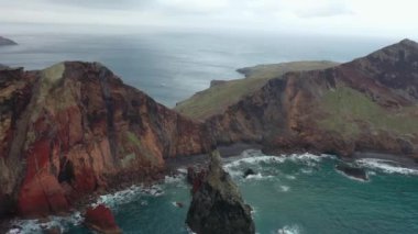 Epic flight over the wonderful viewpoint called Ponta de So Loureno in Madeira, Portugal. A great coast with many cliffs.